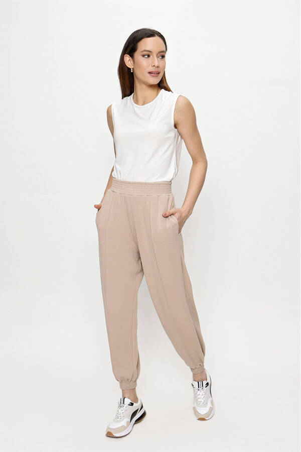 Bej Paça ve Bel Lastik Detaylı Örme Pantolon - 1