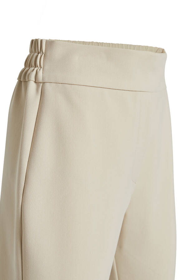 Bej Kalın Kemerli Lastikli Pantolon - Aker (1)