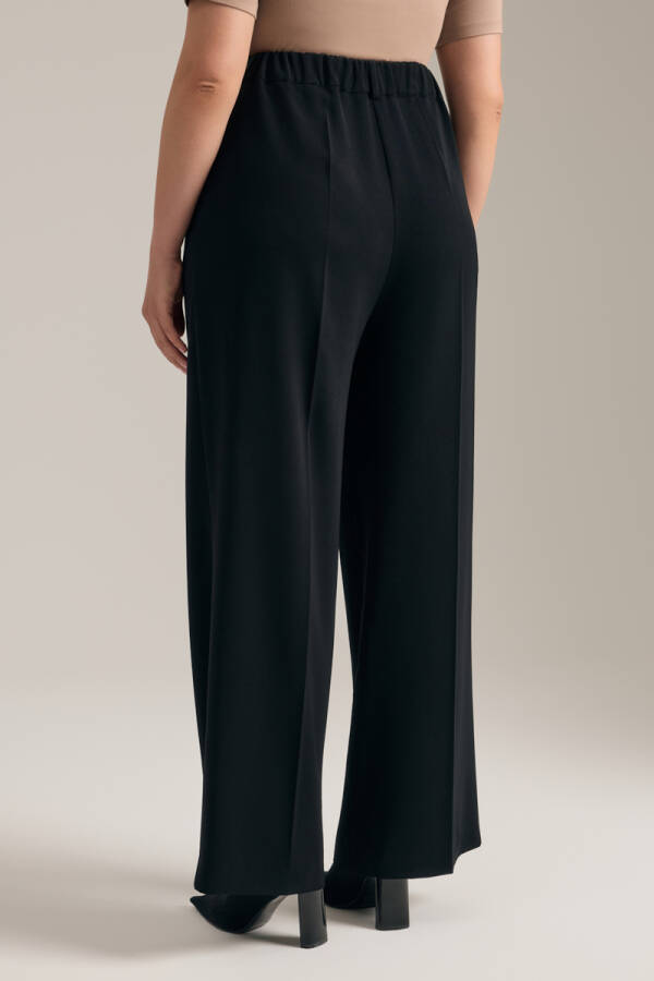 Siyah Dökümlü Bol Pantolon - 6